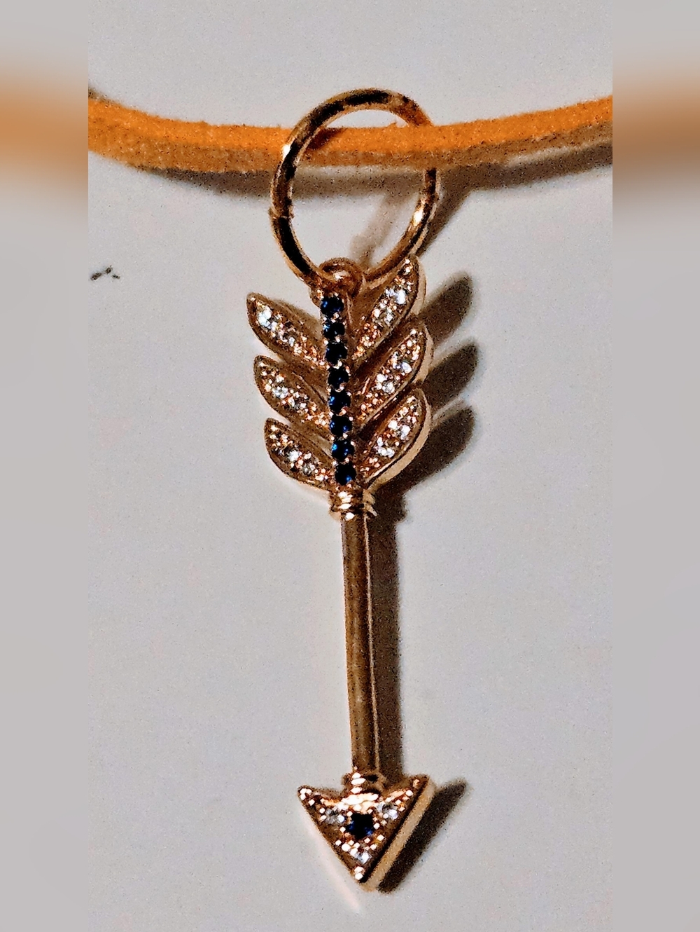 Gold Arrow Pendant Necklace with Blue and Clear Stones